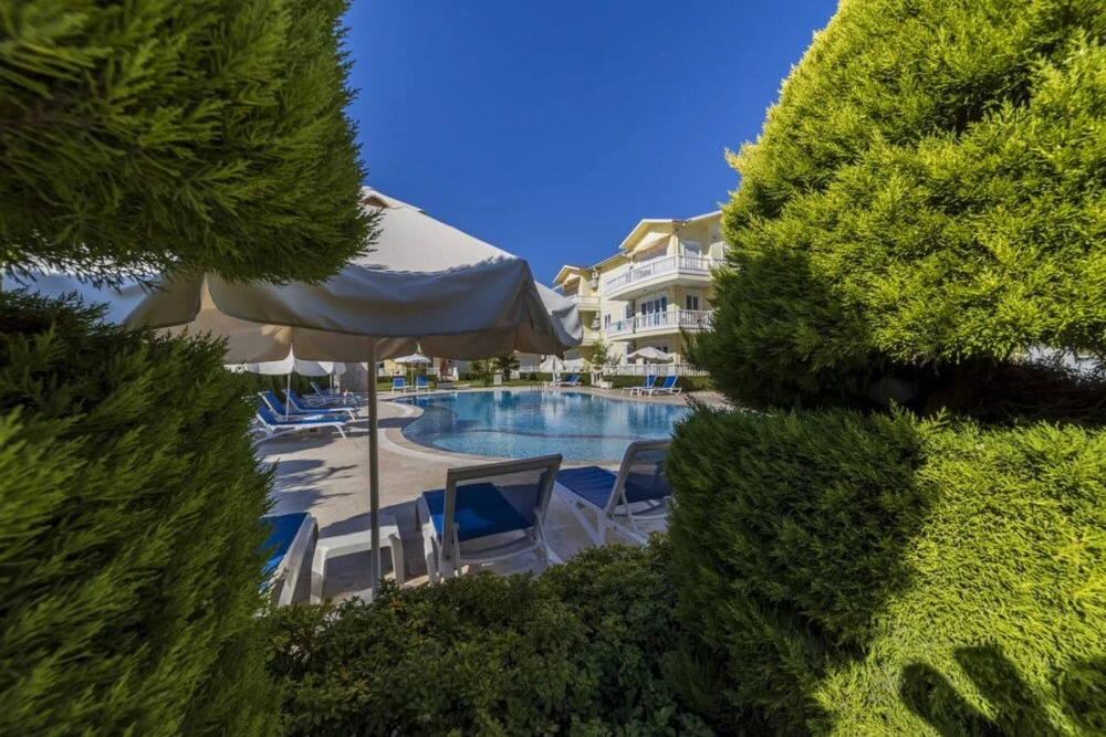 Белек: Vibrant Flat with Shared Pool in Belek