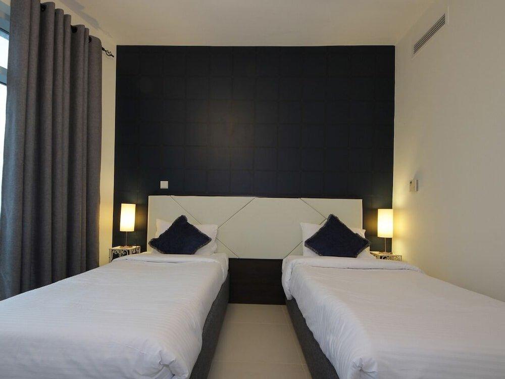 Дубай: Vacation Bay - Loft West Tower - Boulevard View