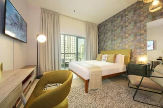Дубай: Signature Holiday Homes - Elegant Studio Apartment in Arena Apartments