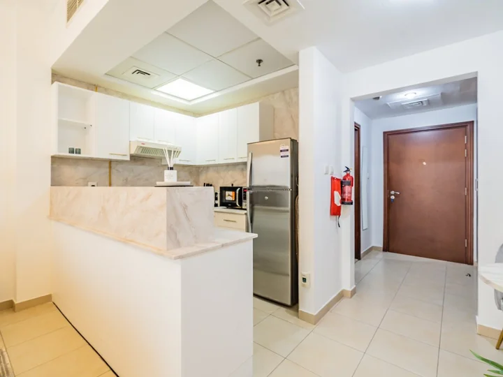 Дубай: Apartments Delightful Studio with Balcony Burj Al Nujoom