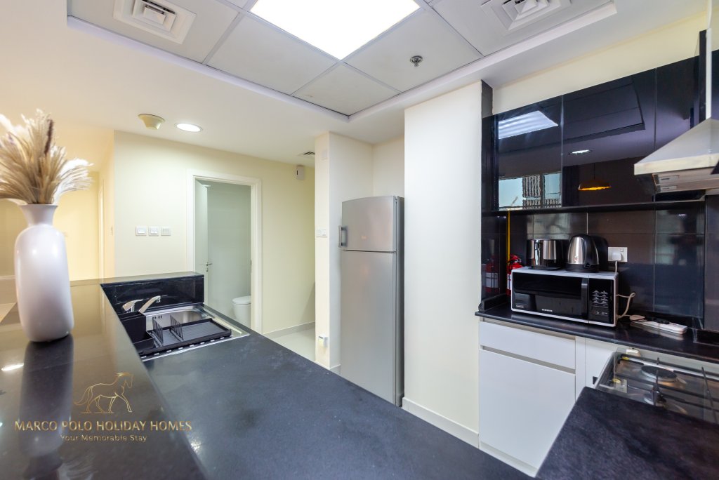 Дубай: Апартаменты Marco Polo - Colorful Charm with Captivating City Views