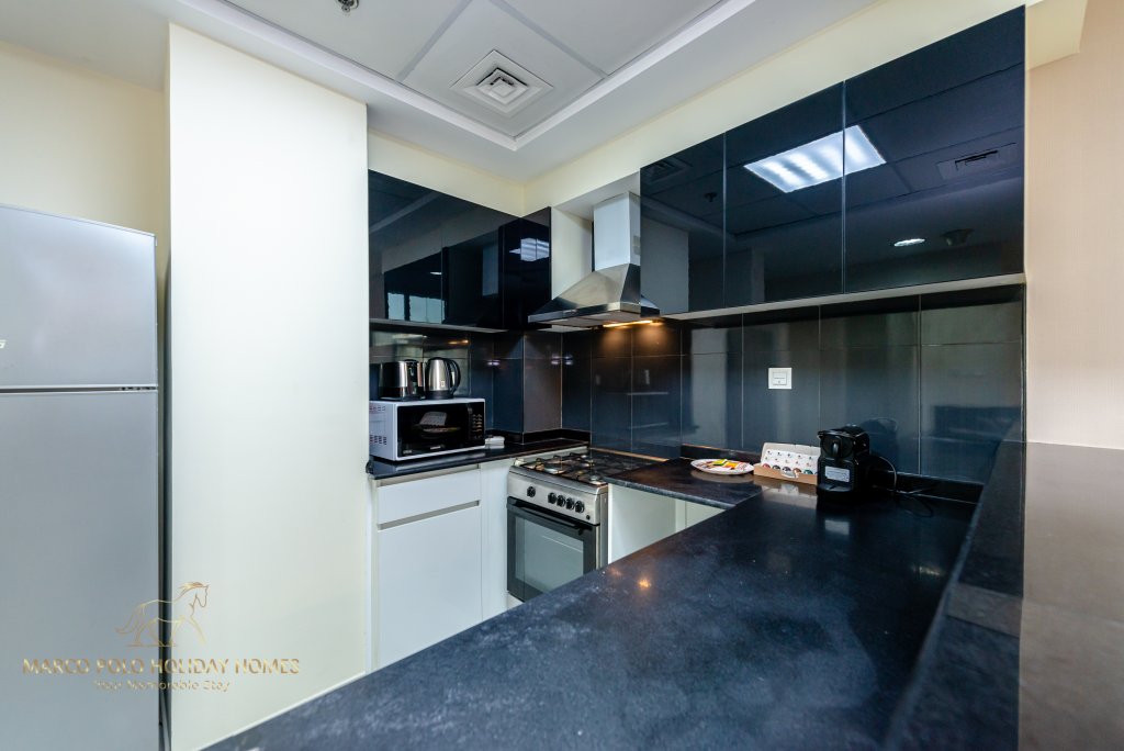 Дубай: Апартаменты Marco Polo - Colorful Charm with Captivating City Views