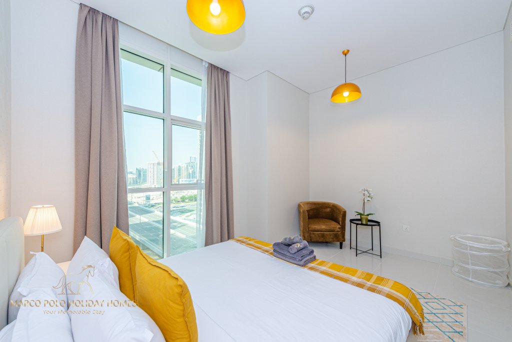 Дубай: Апартаменты Marco Polo - Colorful Charm with Captivating City Views
