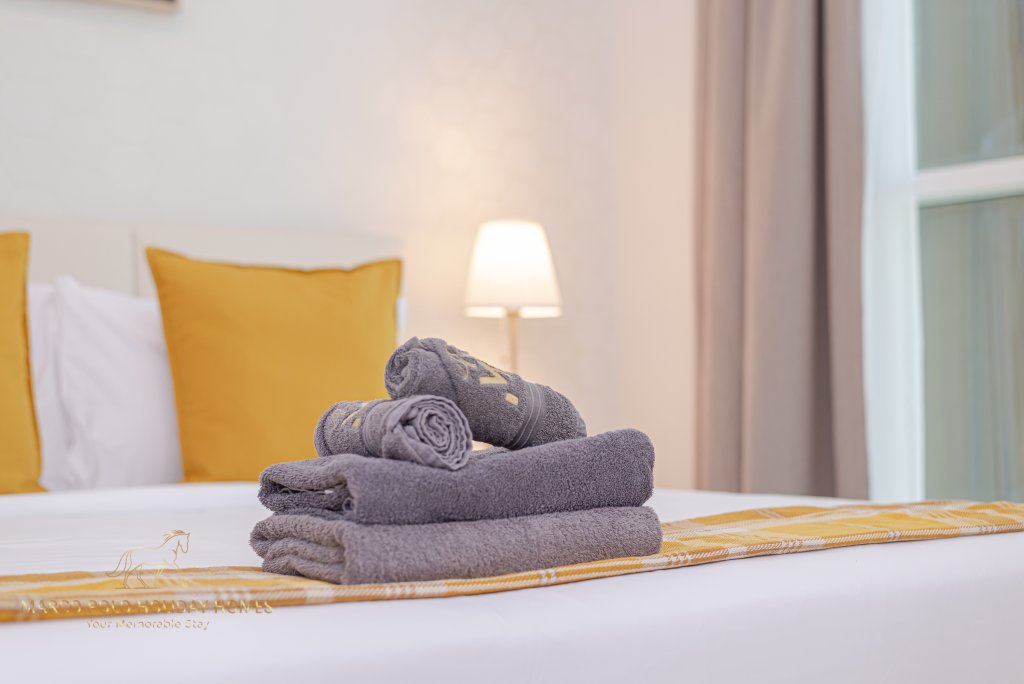 Дубай: Апартаменты Marco Polo - Colorful Charm with Captivating City Views