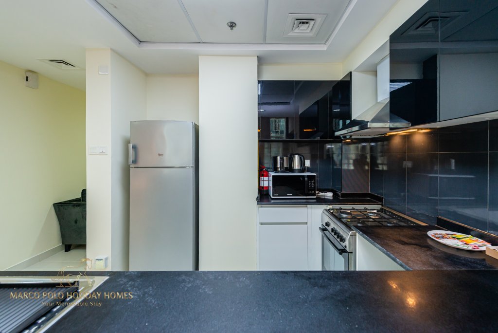 Дубай: Апартаменты Marco Polo - Colorful Charm with Captivating City Views