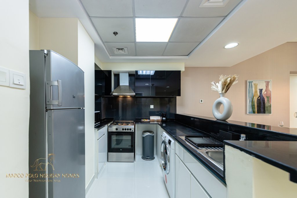 Дубай: Апартаменты Marco Polo - Colorful Charm with Captivating City Views