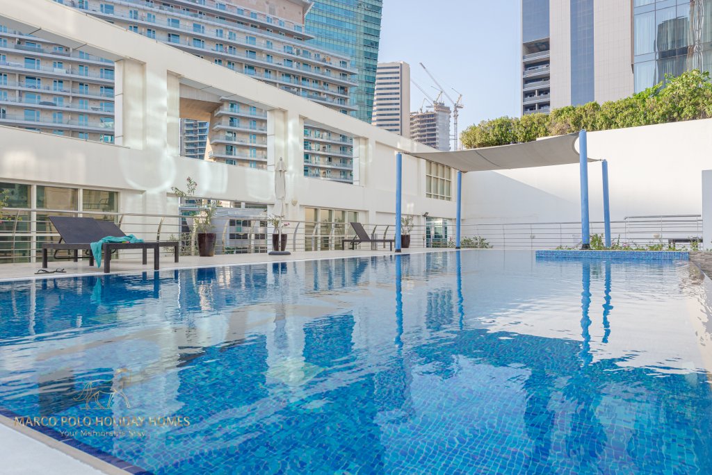 Дубай: Апартаменты Marco Polo - Colorful Charm with Captivating City Views