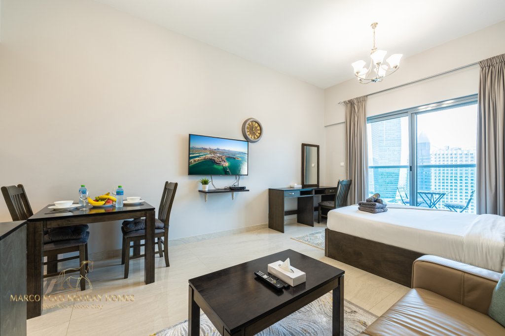 Дубай: Апартаменты Marco Polo - Sleek Studio With Lake And Burj Khalifa Views