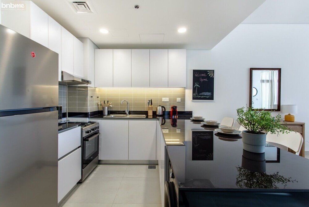 Дубай: Lux 2 BR Apt Expo Dubai South by Bnbme Homes