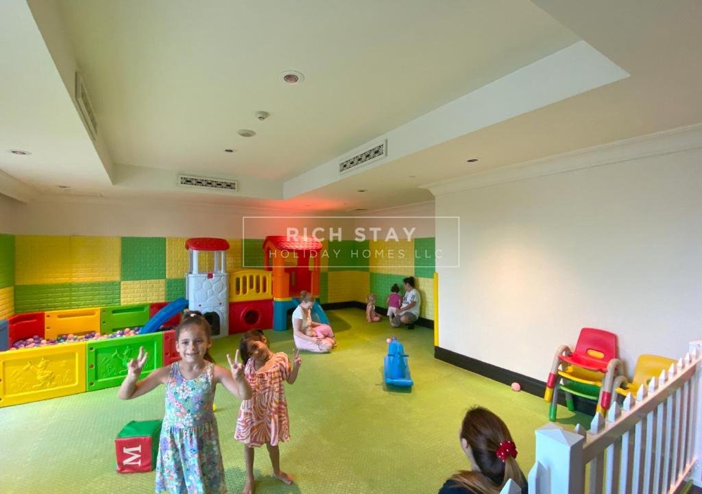 Дубай: Spectacular 2BR in Souk Al Bahar, Downtown with Burj & Dubai Mall view by Rich Stay