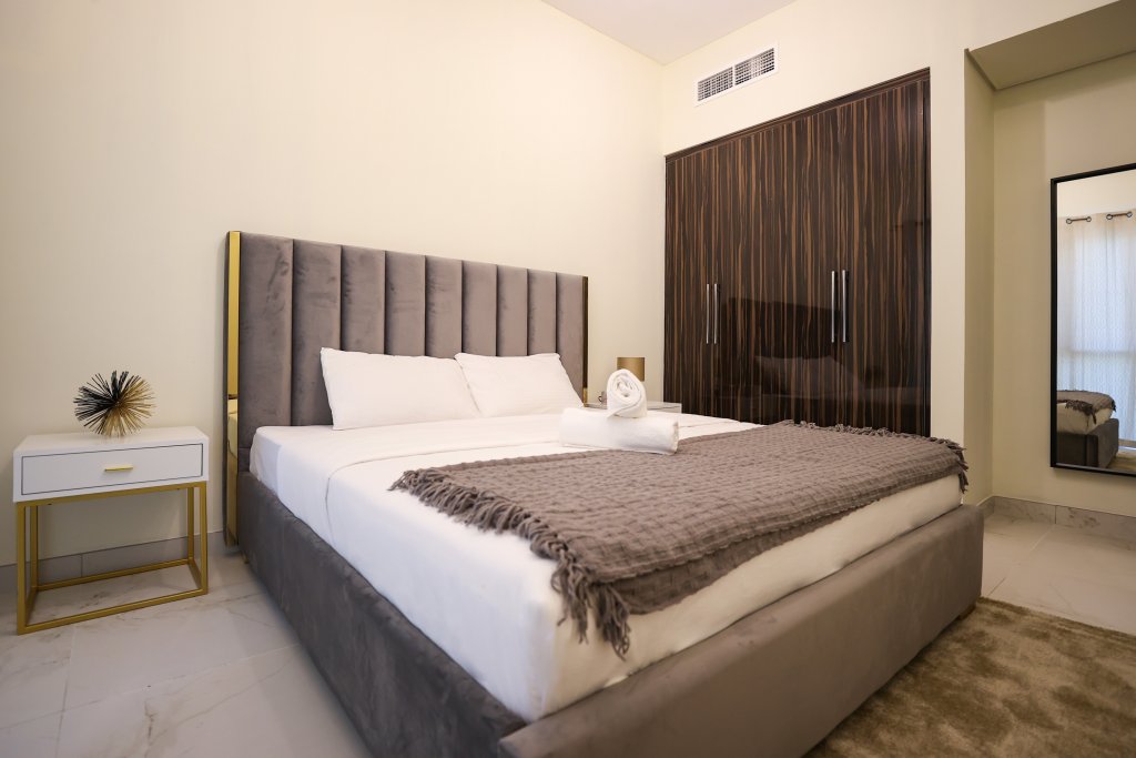 Дубай: Elite LUX Holiday Homes - Cozy & Modern 1BR in Dubai South