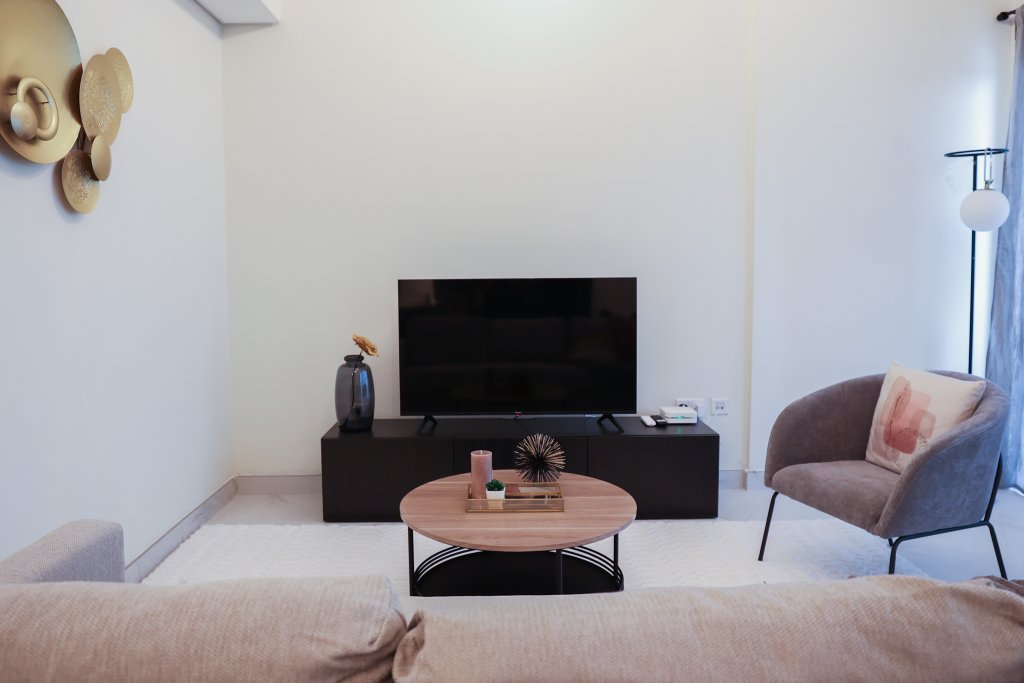 Дубай: Elite LUX Holiday Homes - Cozy & Modern 1BR in Dubai South