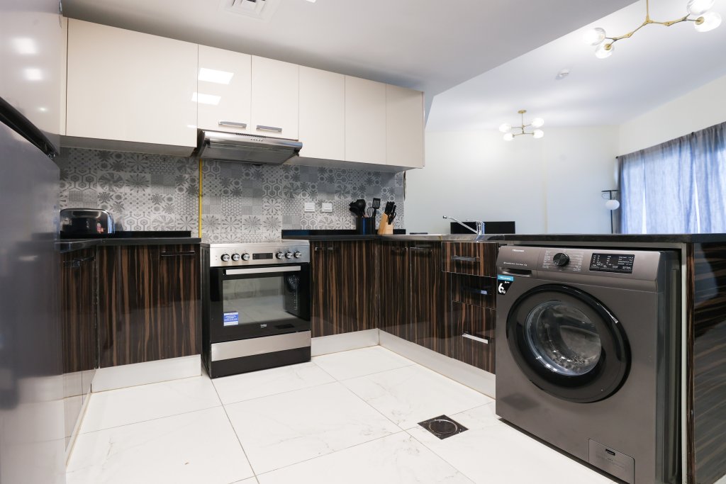 Дубай: Elite LUX Holiday Homes - Cozy & Modern 1BR in Dubai South