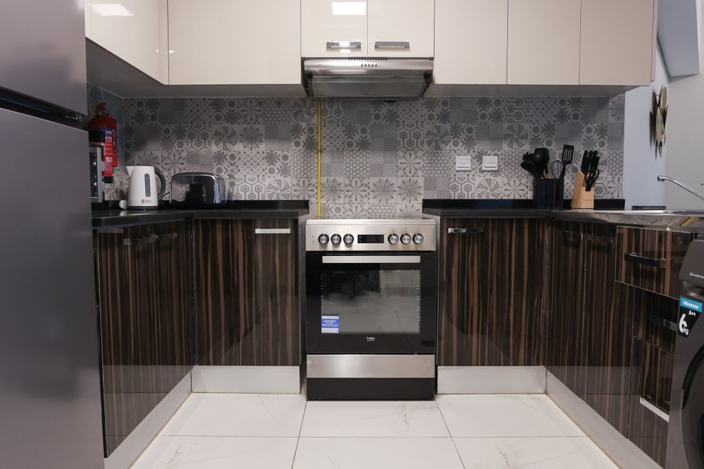 Дубай: Elite LUX Holiday Homes - Cozy & Modern 1BR in Dubai South