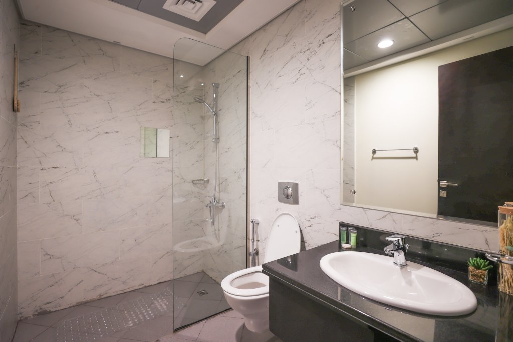 Дубай: Elite LUX Holiday Homes - Cozy & Modern 1BR in Dubai South