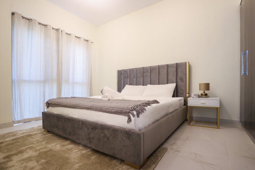 Дубай: Elite LUX Holiday Homes - Cozy & Modern 1BR in Dubai South