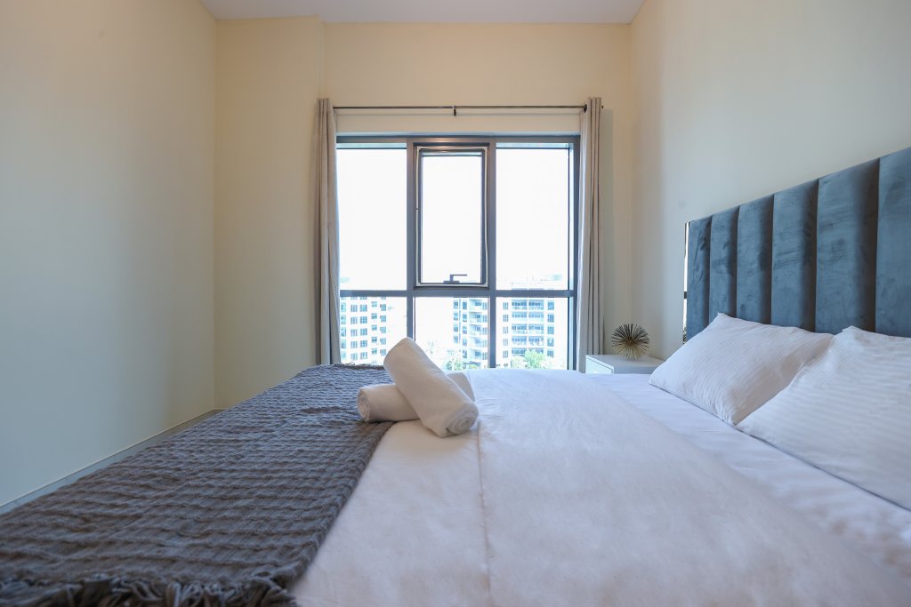 Дубай: Elite LUX Holiday Homes - Cozy & Modern 1BR in Dubai South