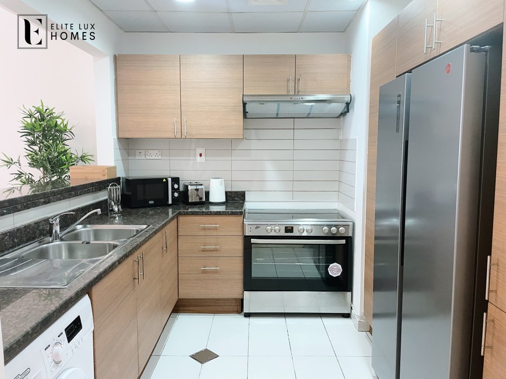 Дубай: Elite LUX Holiday Homes - Beautiful Escape 2BR | Direct Metro Access in Al Furjan Dubai
