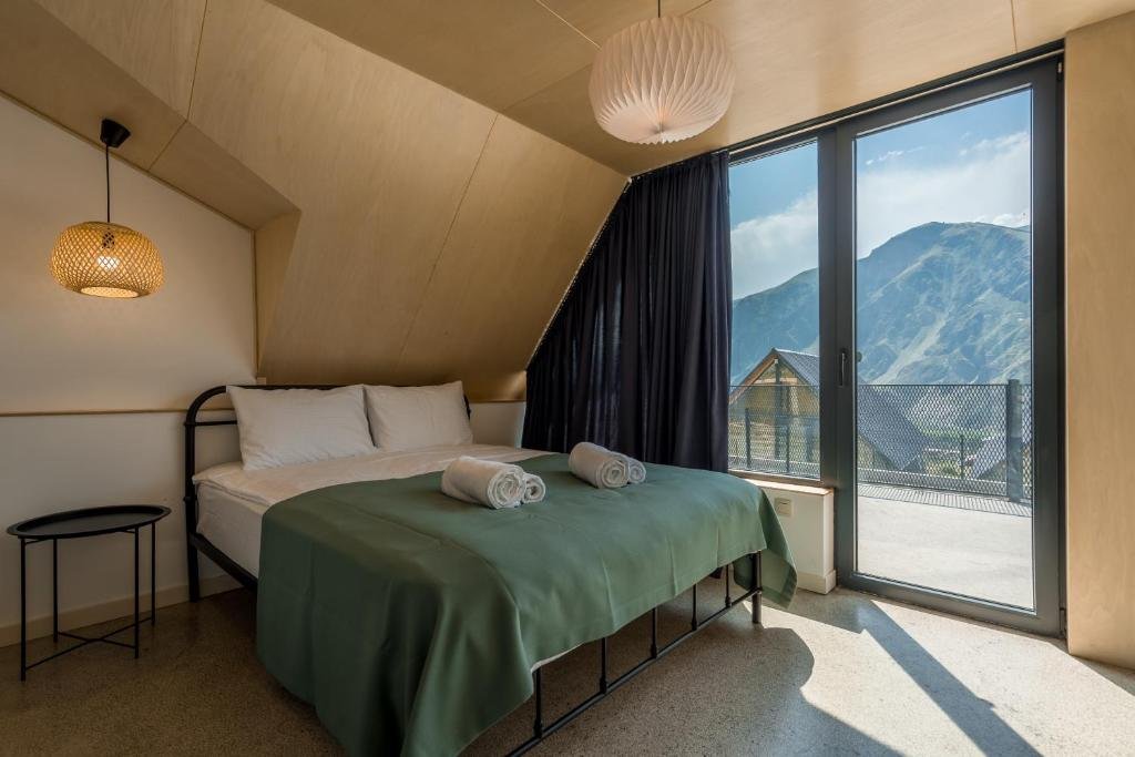 Степанцминда: Kazbegi Targmani Cottages