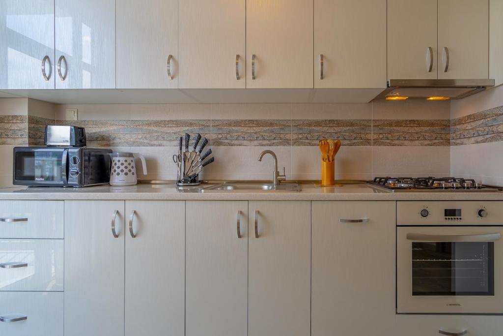 Тбилиси: Proper Apartments Modern Apartment in Avlabari