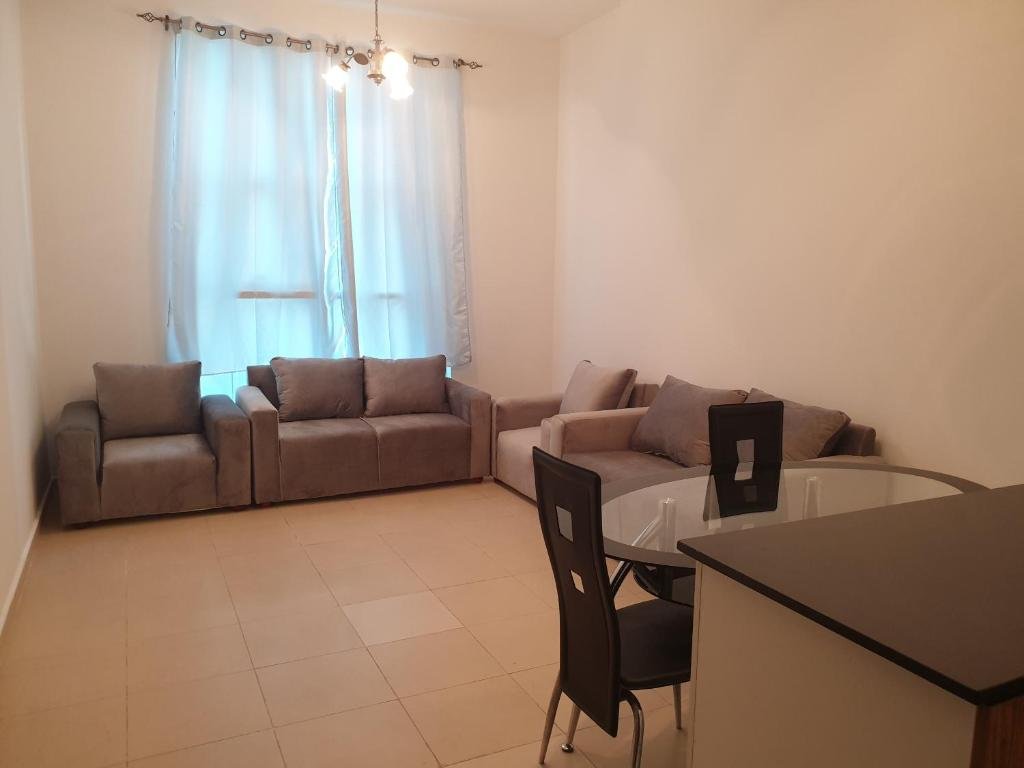 Аджман: Lovely 1-Bedroom Apartment with Free Parking on Premises