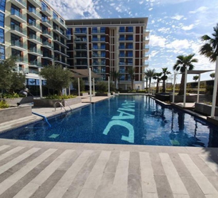 Дубай: Sleek 1BR Apartment at Celestia Dubai South by Deluxe Holiday Homes