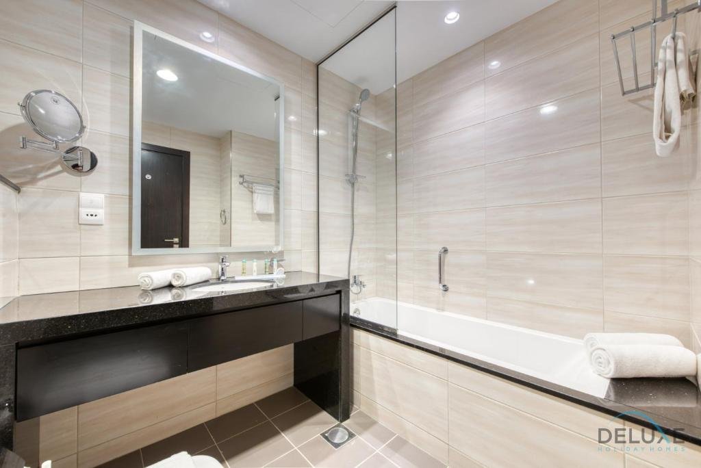 Дубай: Sleek 1BR Apartment at Celestia Dubai South by Deluxe Holiday Homes