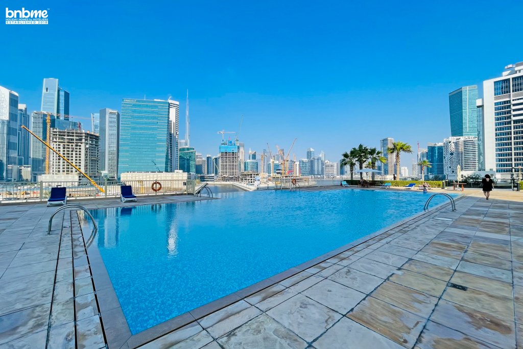 Дубай: Апартаменты bnbmehomes | Great Value 1 BR over looking Canal-303