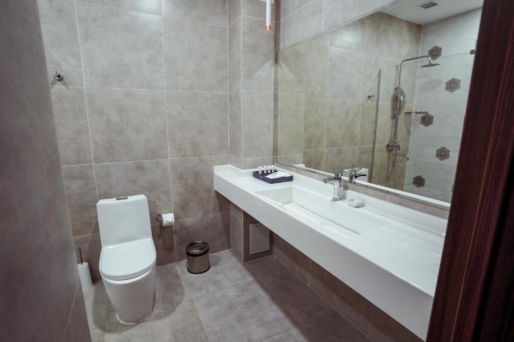 Шымкент: Отель Tauke Khan Plaza