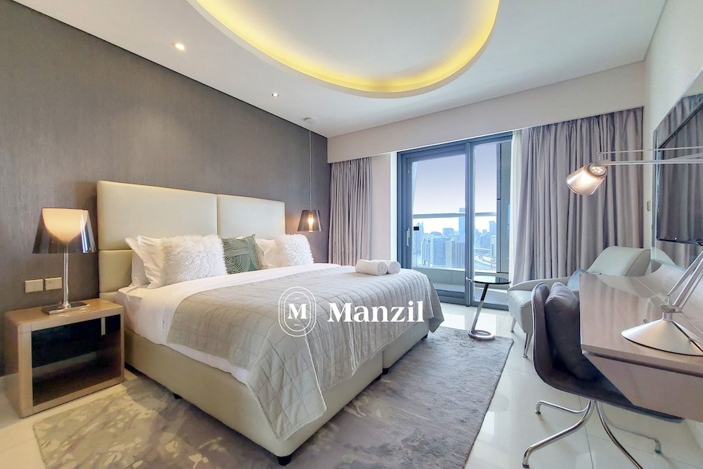 Дубай: Manzil - Cozy 1BR in Paramount w Burj Khalifa View