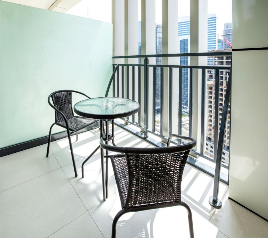 Дубай: Tanin - Exquisite 1BR Apt in Zada Tower with Canal Views