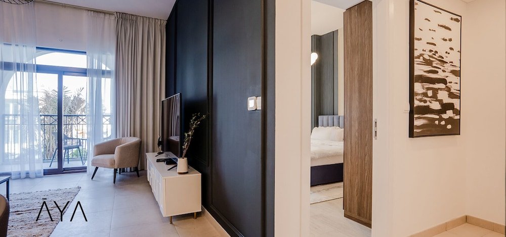 Дубай: Aya - Modern 1BR Apartment with Balcony in Rahaal 2