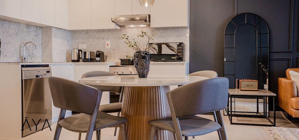 Дубай: Aya - Modern 1BR Apartment with Balcony in Rahaal 2