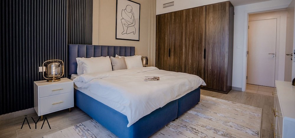 Дубай: Aya - Modern 1BR Apartment with Balcony in Rahaal 2