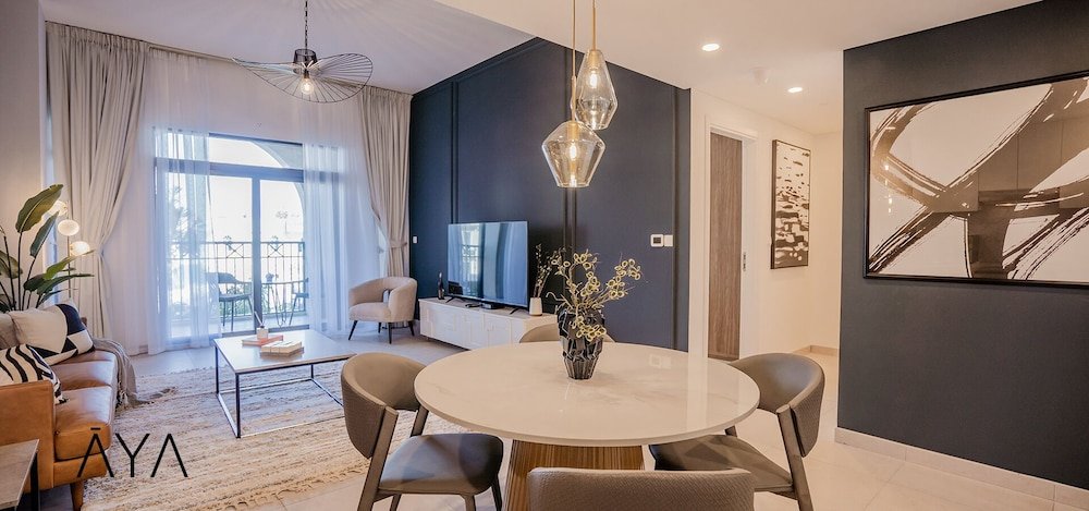 Дубай: Aya - Modern 1BR Apartment with Balcony in Rahaal 2
