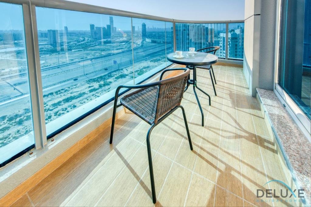 Дубай: Modern 2 BR Apartment at Elite Residences 7 Sports City by Deluxe Holiday Homes