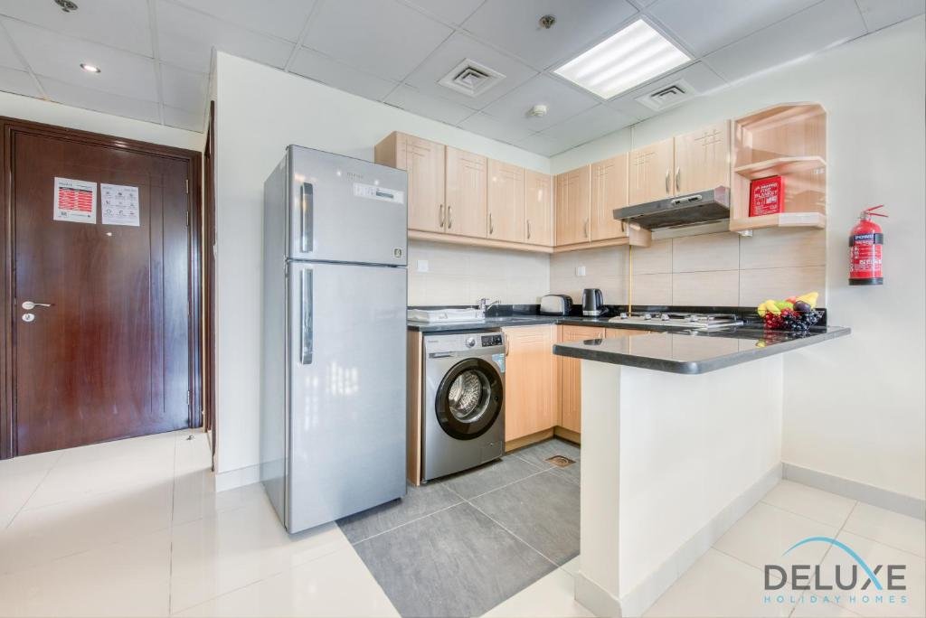 Дубай: Modern 2 BR Apartment at Elite Residences 7 Sports City by Deluxe Holiday Homes