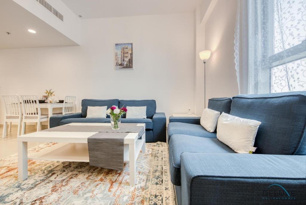 Дубай: Innovative 1 BR Apartment at Pulse Residence Dubai South by Deluxe Holiday Homes