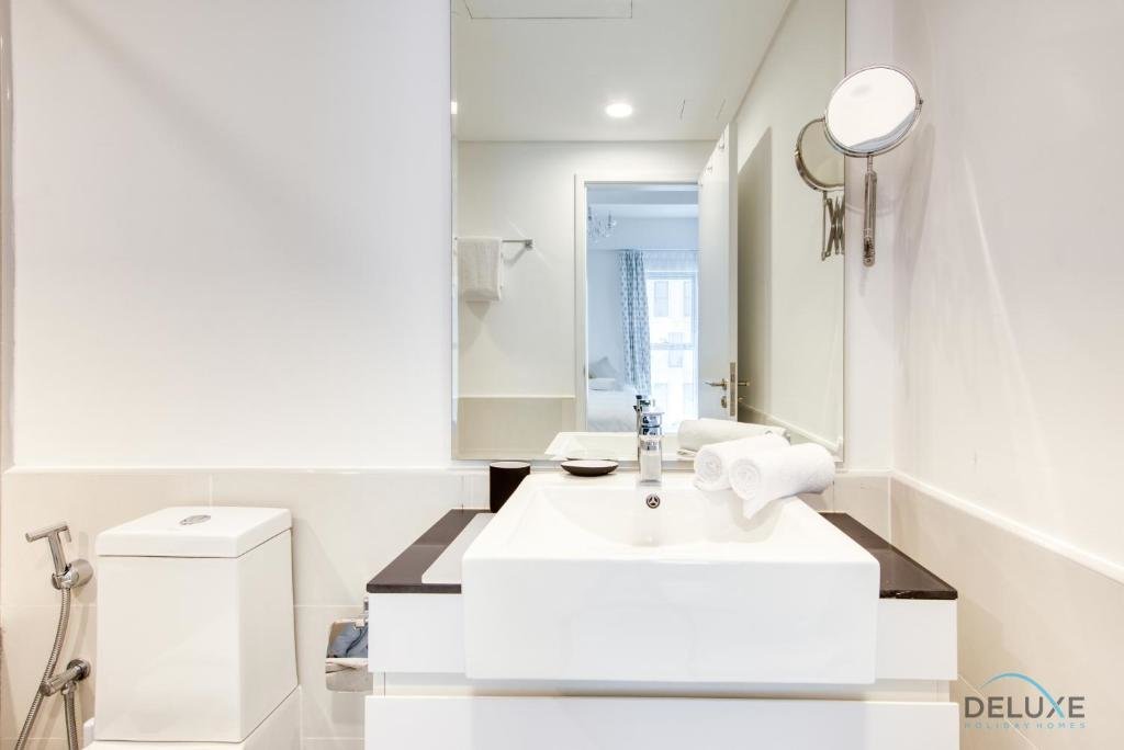 Дубай: Innovative 1 BR Apartment at Pulse Residence Dubai South by Deluxe Holiday Homes