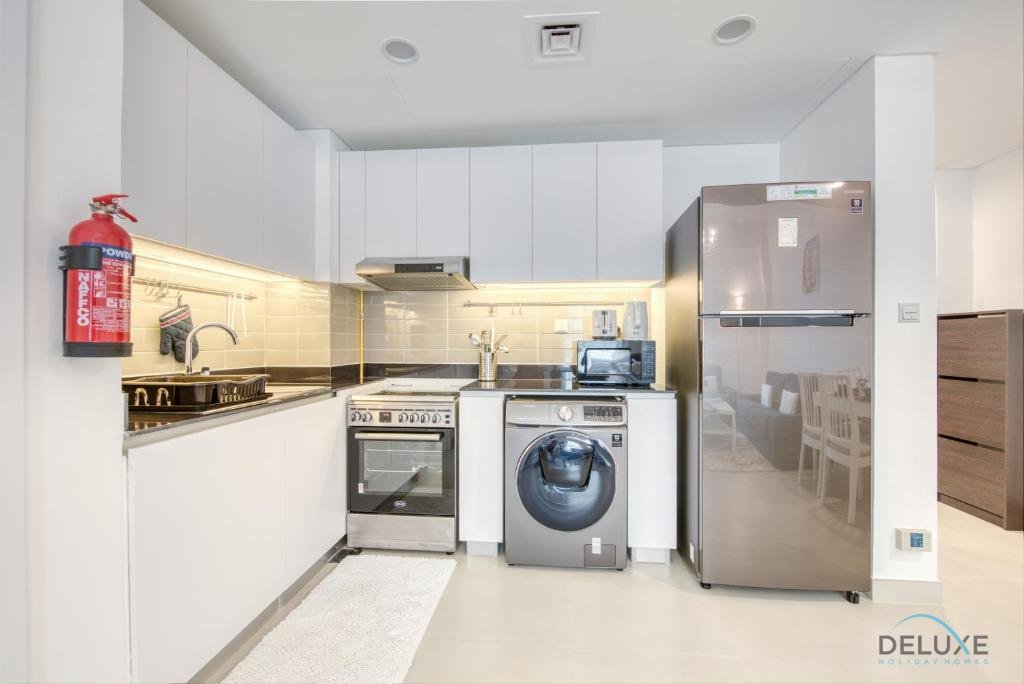 Дубай: Innovative 1 BR Apartment at Pulse Residence Dubai South by Deluxe Holiday Homes
