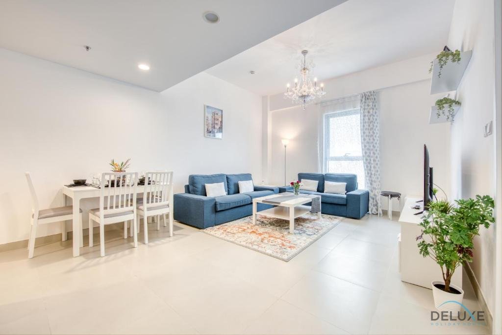 Дубай: Innovative 1 BR Apartment at Pulse Residence Dubai South by Deluxe Holiday Homes