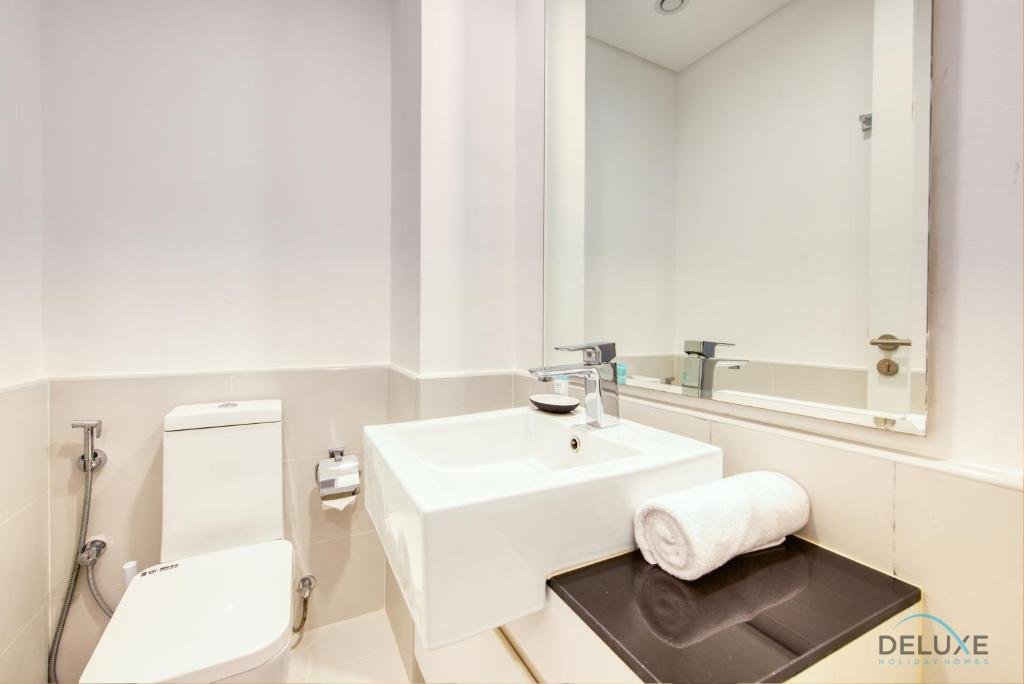Дубай: Innovative 1 BR Apartment at Pulse Residence Dubai South by Deluxe Holiday Homes