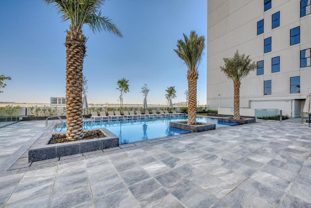 Дубай: Innovative 1 BR Apartment at Pulse Residence Dubai South by Deluxe Holiday Homes