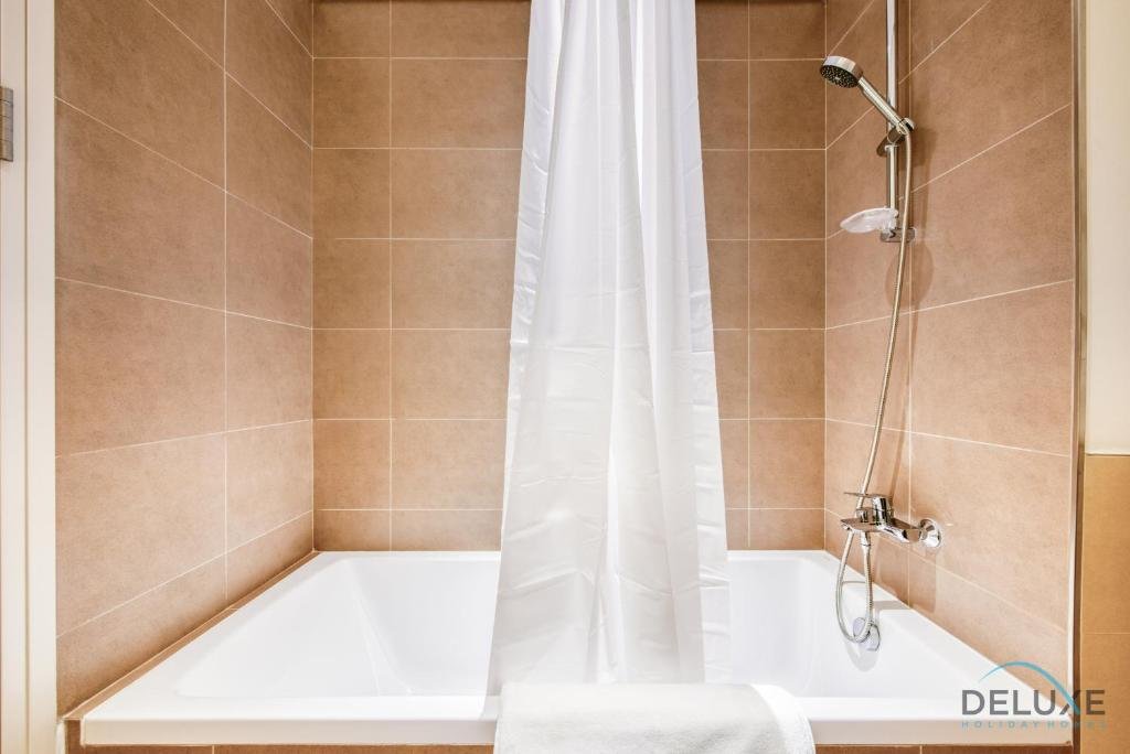 Дубай: Welcoming 2-bedroom Apartment at Park Heights, Dubai Hills by Deluxe Holiday Homes