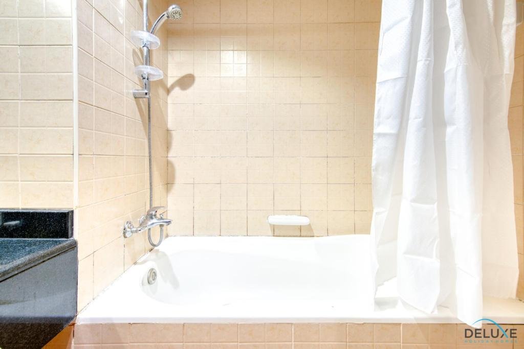 Дубай: Restful 1BR at Mediterranean Discovery Gardens by Deluxe Holiday Homes