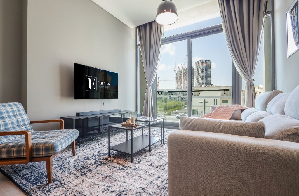 Дубай: Апартаменты Elite LUX Holiday Homes - Luxurious 1BR Suite in Signature Livings JVC - Dubai