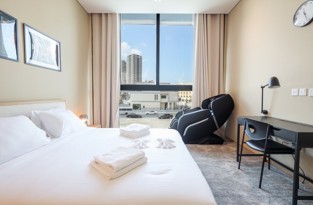 Дубай: Апартаменты Elite LUX Holiday Homes - Luxurious 1BR Suite in Signature Livings JVC - Dubai