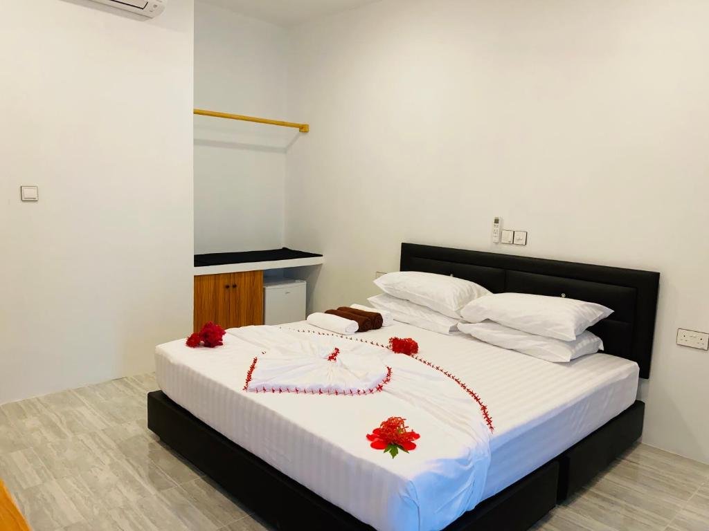 Атолл Алиф-Алиф: Thoddoo White Sand Inn
