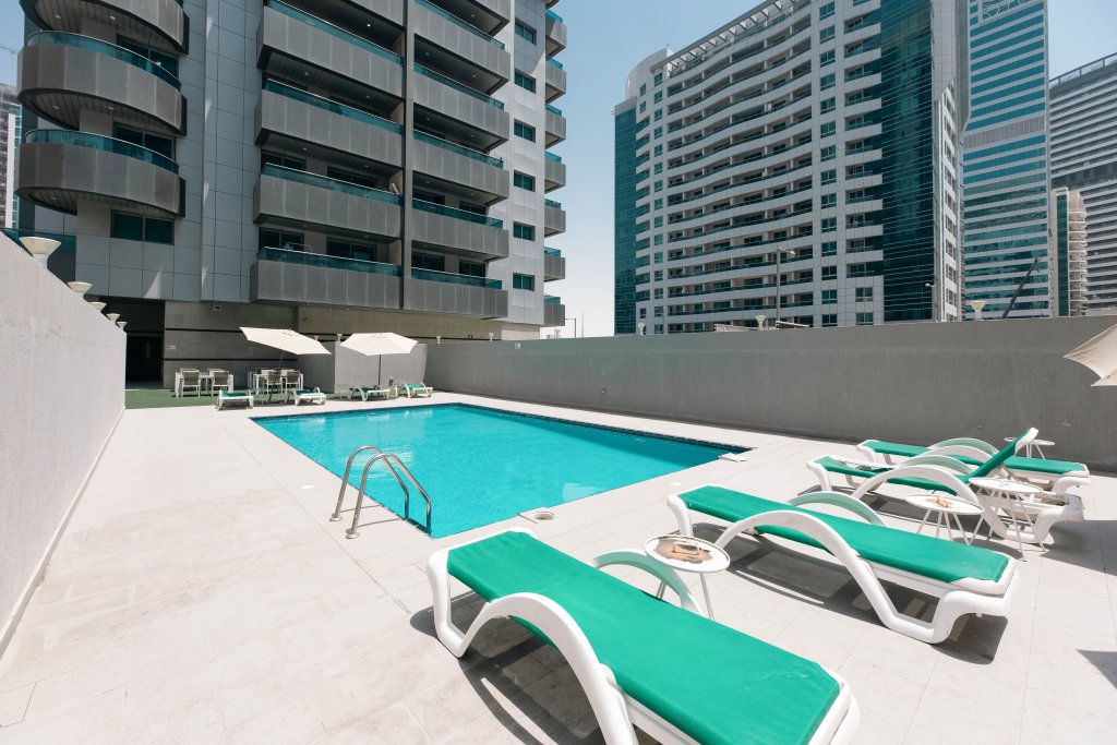 Дубай: Апартаменты Urban Caves - Stylish Condo Near Marina Walk With City Views
