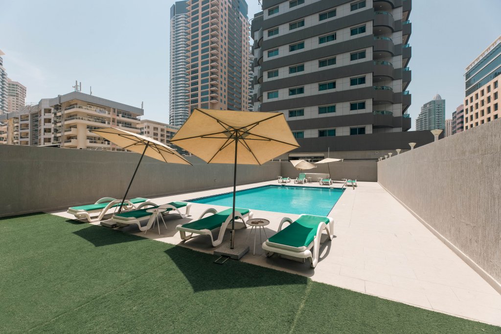 Дубай: Апартаменты Urban Caves - Stylish Condo Near Marina Walk With City Views